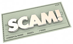 a check with the word scam across it