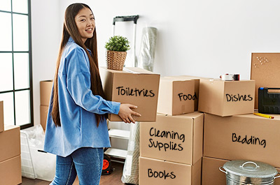 teen moving into dorm room