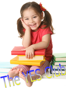 young girl sitting down surrounded by books
